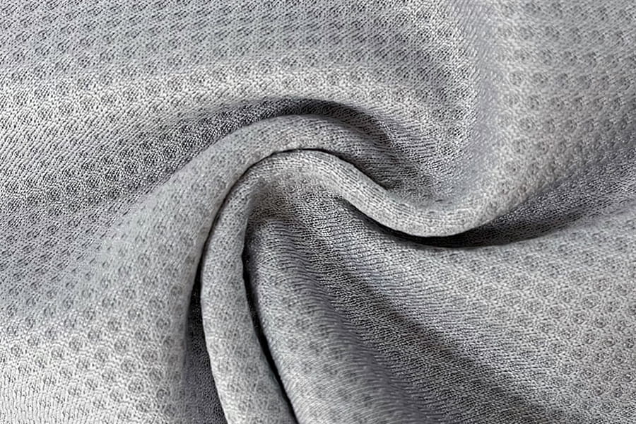 BCX-N0608: Víz abszorpciós és hűvös érzésű monokróm jacquard háló méhsejtszövet